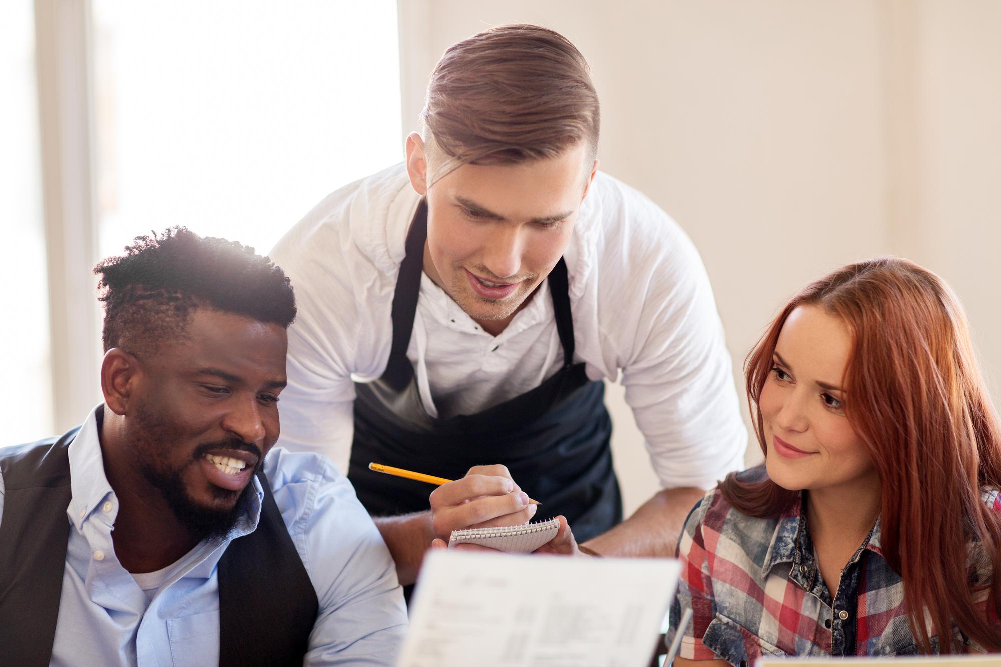 consultation meeting in a kitchen with chef and consultant